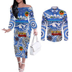 Custom North Melbourne Kangaroos NAIDOC Week 2024 Couples Matching Off The Shoulder Long Sleeve Dress and Long Sleeve Button Shirt Mascot Football