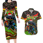 Merry Christmas Penrith Panthers Couples Matching Long Sleeve Bodycon Dress and Hawaiian Shirt Aboriginal Santa Rugby Mascot - The Riff