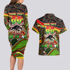 Merry Christmas Penrith Panthers Couples Matching Long Sleeve Bodycon Dress and Hawaiian Shirt Aboriginal Santa Rugby Mascot - The Riff