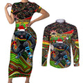Merry Christmas Penrith Panthers Couples Matching Short Sleeve Bodycon Dress and Long Sleeve Button Shirt Aboriginal Santa Rugby Mascot - The Riff