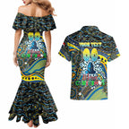 Merry Christmas Gold Coast Titans Couples Matching Mermaid Dress and Hawaiian Shirt Aboriginal Santa Rugby Mascot - Light Blue