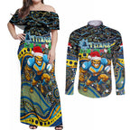 Merry Christmas Gold Coast Titans Couples Matching Off Shoulder Maxi Dress and Long Sleeve Button Shirt Aboriginal Santa Rugby Mascot - Light Blue