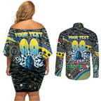 Merry Christmas Gold Coast Titans Couples Matching Off Shoulder Short Dress and Long Sleeve Button Shirt Aboriginal Santa Rugby Mascot - Light Blue