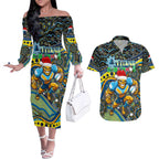 Merry Christmas Gold Coast Titans Couples Matching Off The Shoulder Long Sleeve Dress and Hawaiian Shirt Aboriginal Santa Rugby Mascot - Light Blue