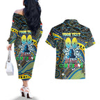 Merry Christmas Gold Coast Titans Couples Matching Off The Shoulder Long Sleeve Dress and Hawaiian Shirt Aboriginal Santa Rugby Mascot - Light Blue