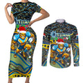 Merry Christmas Gold Coast Titans Couples Matching Short Sleeve Bodycon Dress and Long Sleeve Button Shirt Aboriginal Santa Rugby Mascot - Light Blue