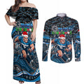 Merry Christmas AFL Carlton Blues Couples Matching Off Shoulder Maxi Dress and Long Sleeve Button Shirt Aboriginal Santa Football Mascot