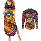 Merry Christmas AFL Gold Coast Suns Couples Matching Summer Maxi Dress and Long Sleeve Button Shirt Aboriginal Santa Football Mascot