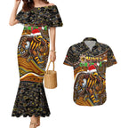Merry Christmas AFL Hawks Couples Matching Mermaid Dress and Hawaiian Shirt Aboriginal Santa Football Mascot