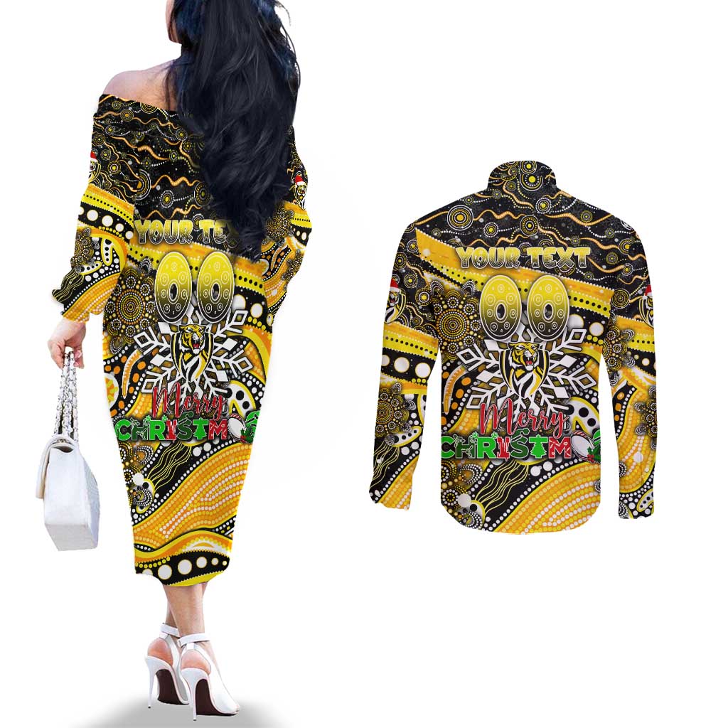 Merry Christmas AFL Richmond Tigers Couples Matching Off The Shoulder Long Sleeve Dress and Long Sleeve Button Shirt Aboriginal Santa Football Mascot