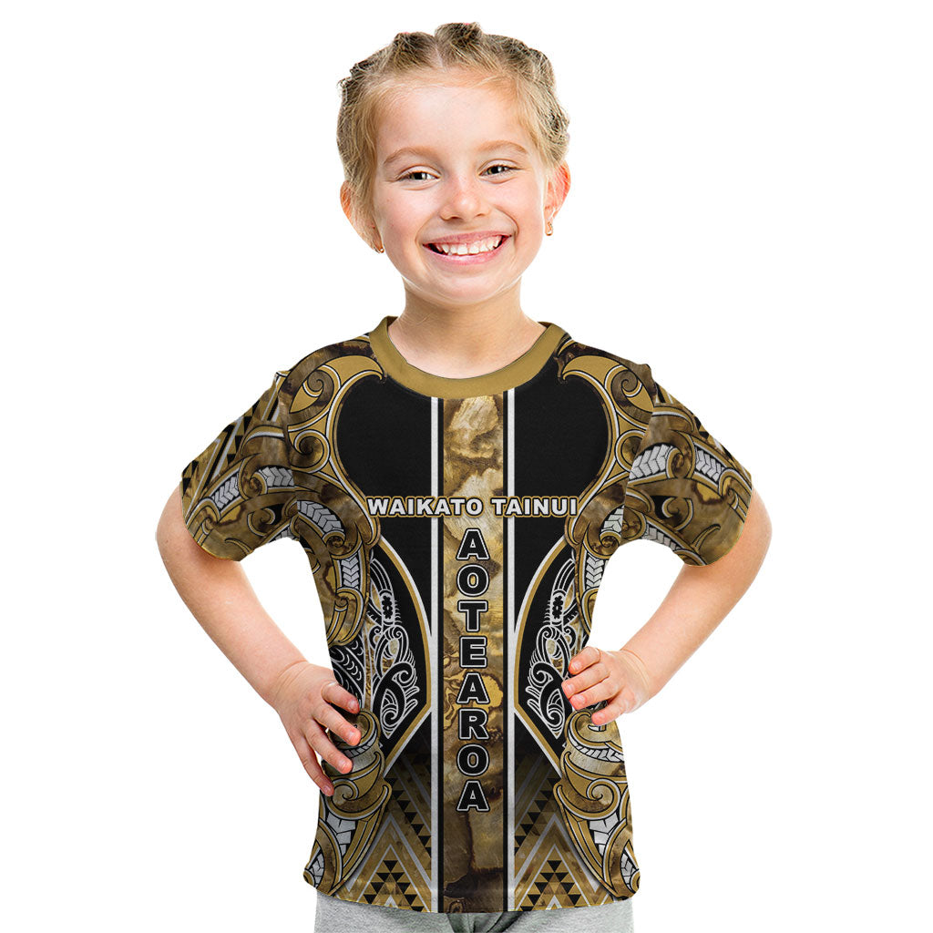 Aotearoa Waikato Tainui Kid T Shirt Maori Light Gold Tribal Paua Shell Pattern
