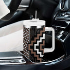 Classic Tukutuku Pattern Aotearoa Tumbler With Handle Niho Taniwha and Puhoro Motifs