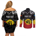 personalised-australia-indigenous-couples-matching-off-shoulder-short-dress-and-long-sleeve-button-shirts-walk-for-yes-2023-aboriginal-flag-style