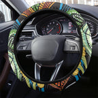 Baby in the Womb Steering Wheel Cover Aboriginal Art Style