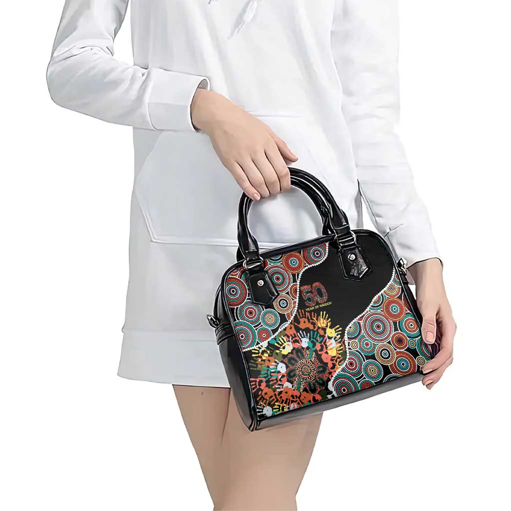 Honouring 50 Year Of NAIDOC Shoulder Handbag Honouring The Next Generation Red Aboriginal Art