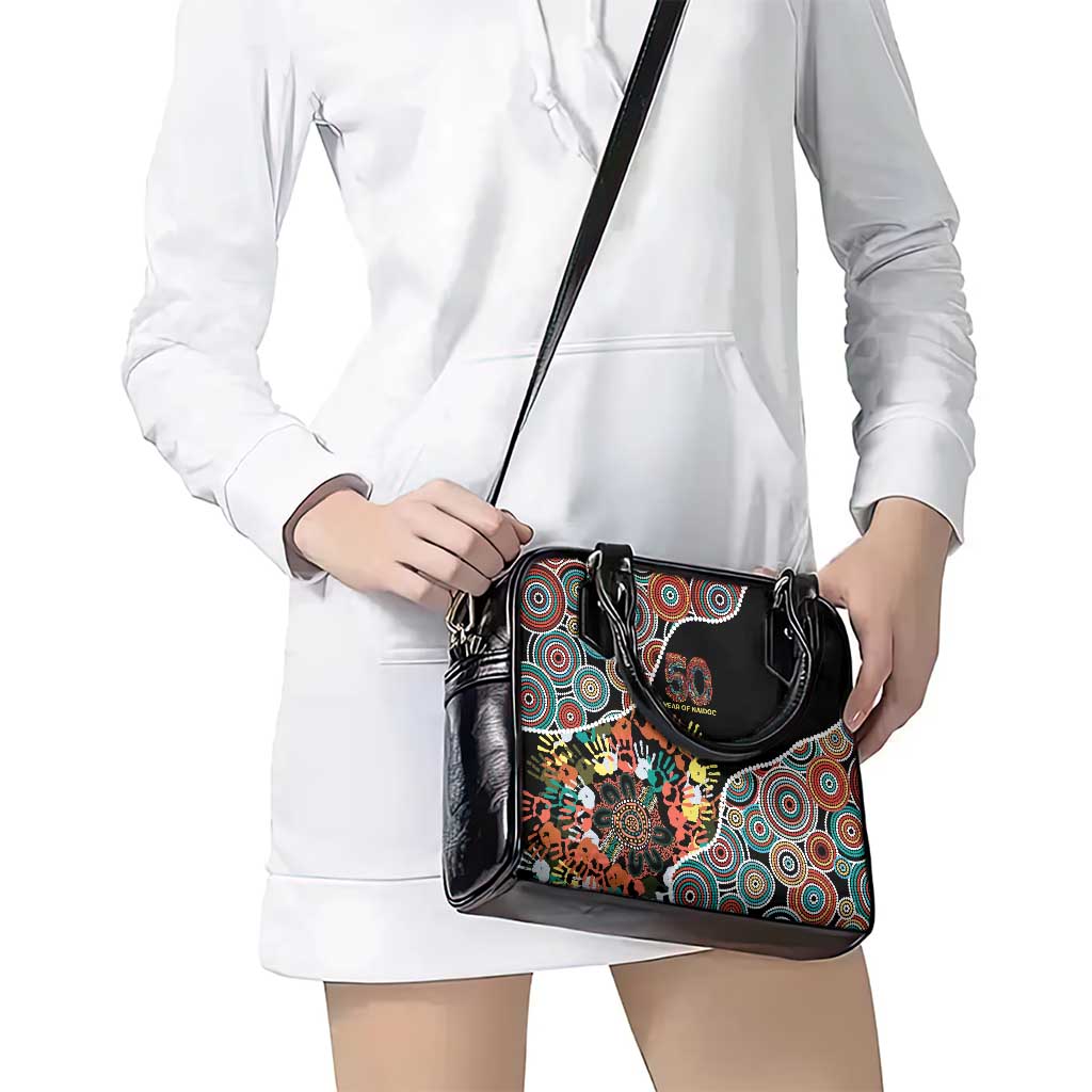 Honouring 50 Year Of NAIDOC Shoulder Handbag Honouring The Next Generation Red Aboriginal Art