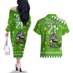 custom-raiders-rugby-couples-matching-off-the-shoulder-long-sleeve-dress-and-hawaiian-shirt-the-mighty-green-machine-2023-christmas-vibe