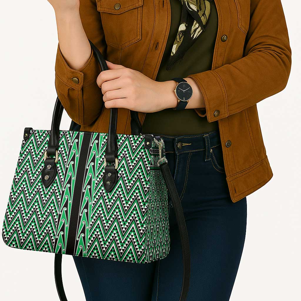 New Zealand Maori Niho Taniwha Leather Bag Kakariki Mangopare and Puhoro Pattern - Aussie Hoodie