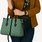 New Zealand Maori Niho Taniwha Leather Bag Kakariki Mangopare and Puhoro Pattern - Aussie Hoodie
