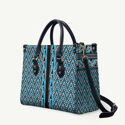 New Zealand Maori Niho Taniwha Leather Bag Kikorangi Mangopare and Puhoro Pattern - Aussie Hoodie