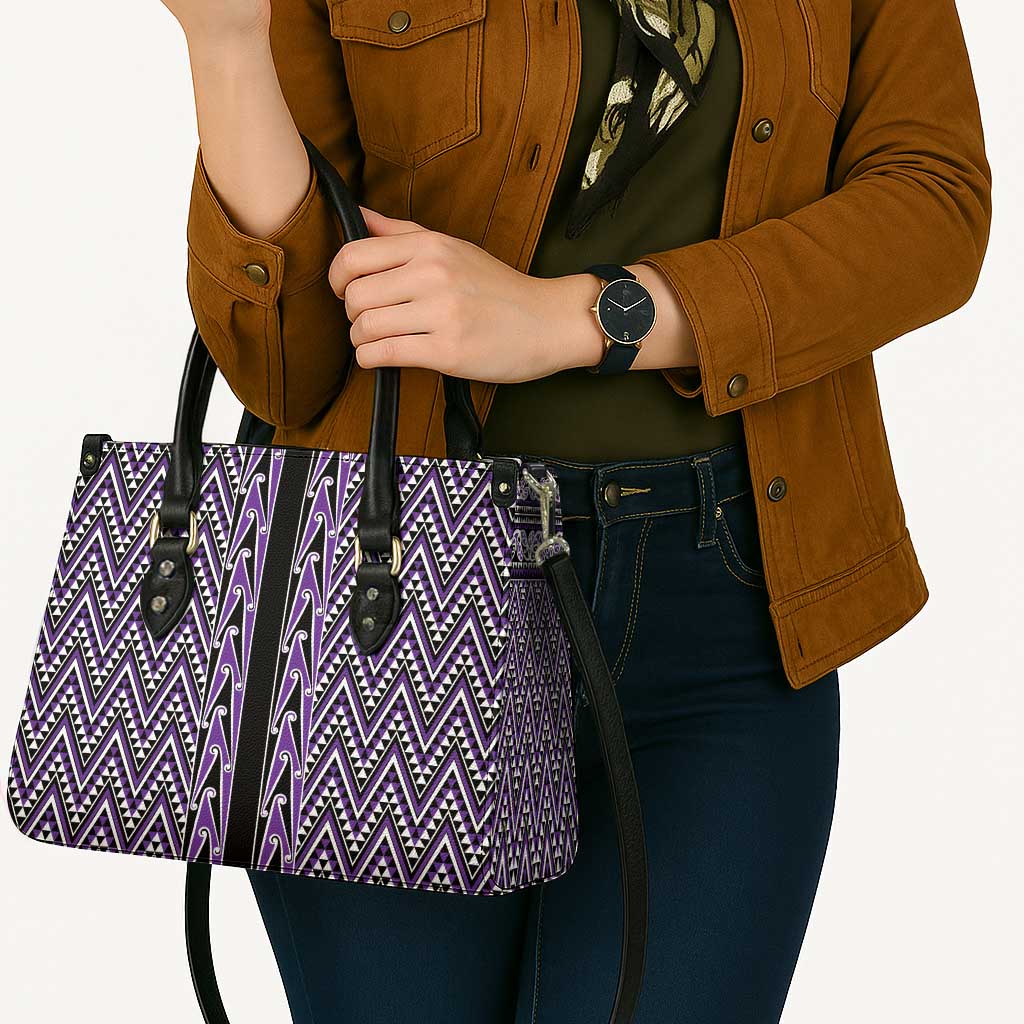 New Zealand Maori Niho Taniwha Leather Bag Waiporopo Mangopare and Puhoro Pattern - Aussie Hoodie