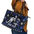 custom-north-kangaroos-football-leather-tote-bag-roos-christmas-vibe-2023