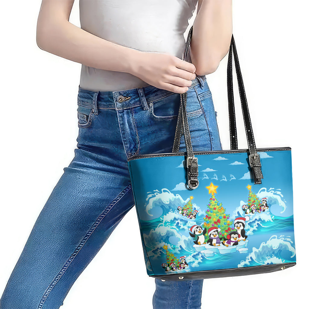 its-penguin-ing-to-look-a-lot-like-christmas-leather-tote-bag