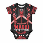 Toitu Te Tiriti Waitangi Baby Onesie Black Wharenui House