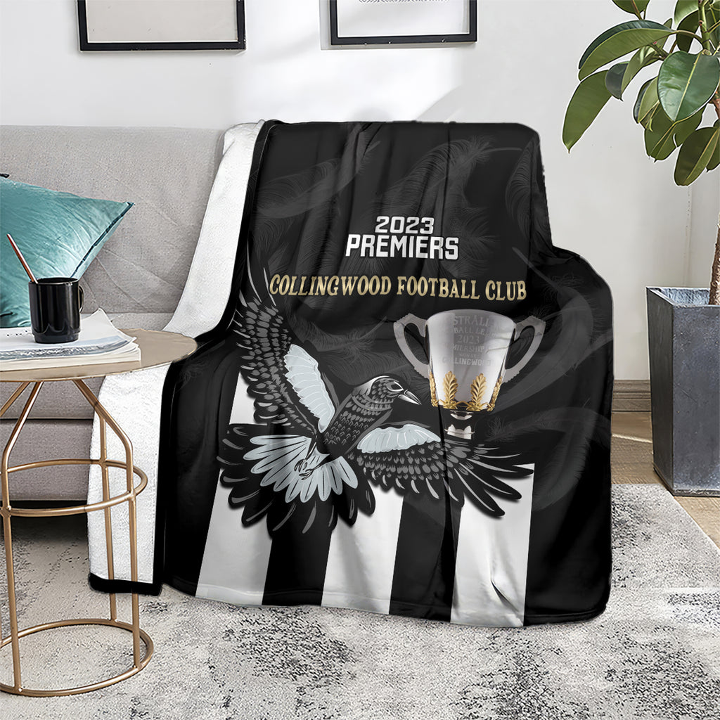 afl-collingwood-blanket-magpies-premiers-2023-with-trophy-proud