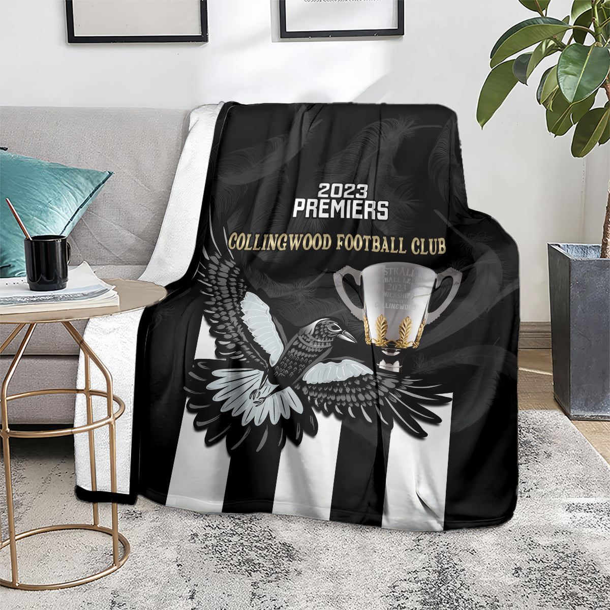 afl-collingwood-blanket-magpies-premiers-2023-with-trophy-proud
