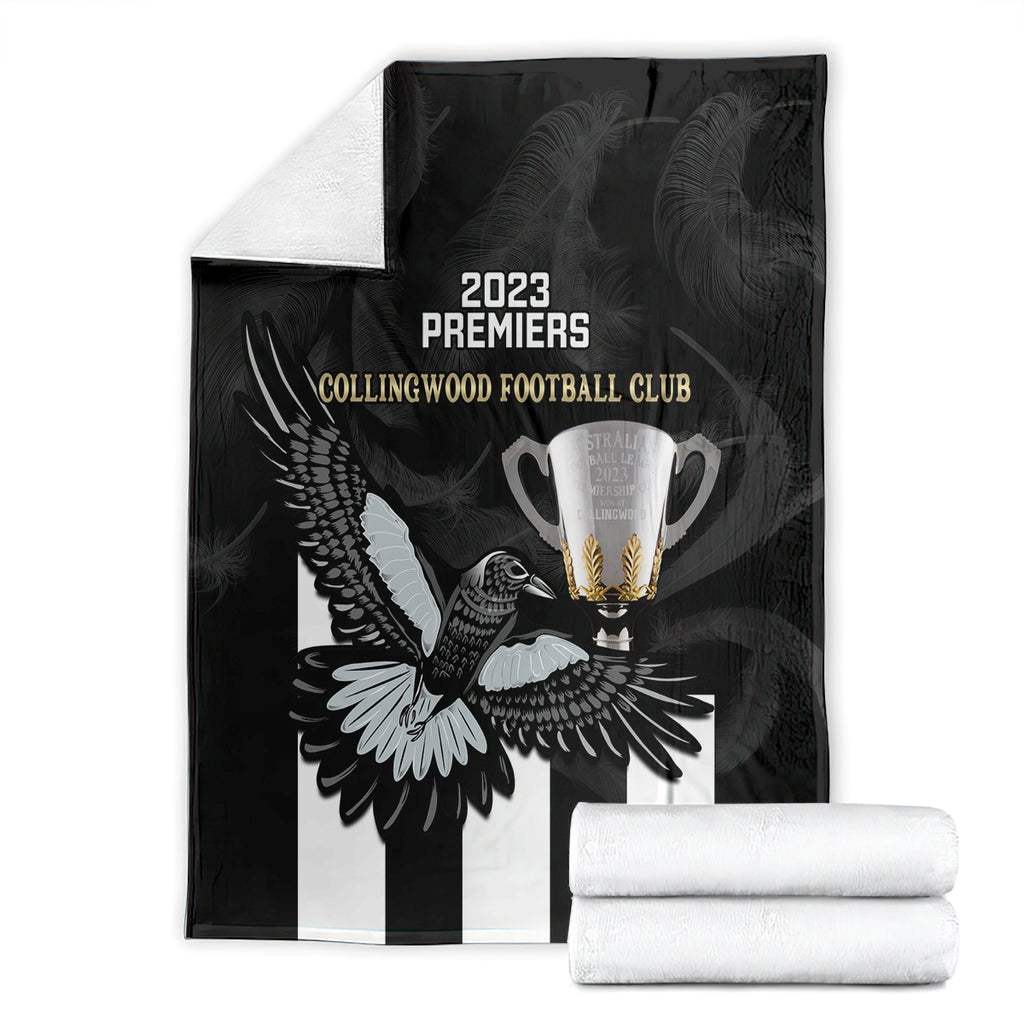 afl-collingwood-blanket-magpies-premiers-2023-with-trophy-proud