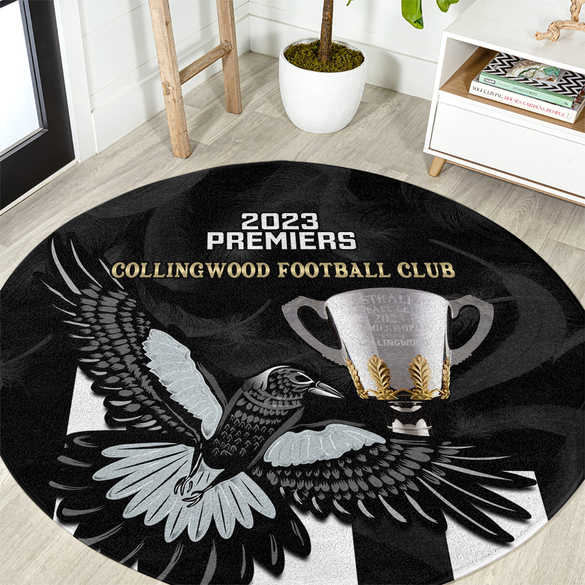afl-collingwood-round-carpet-magpies-premiers-2023-with-trophy-proud