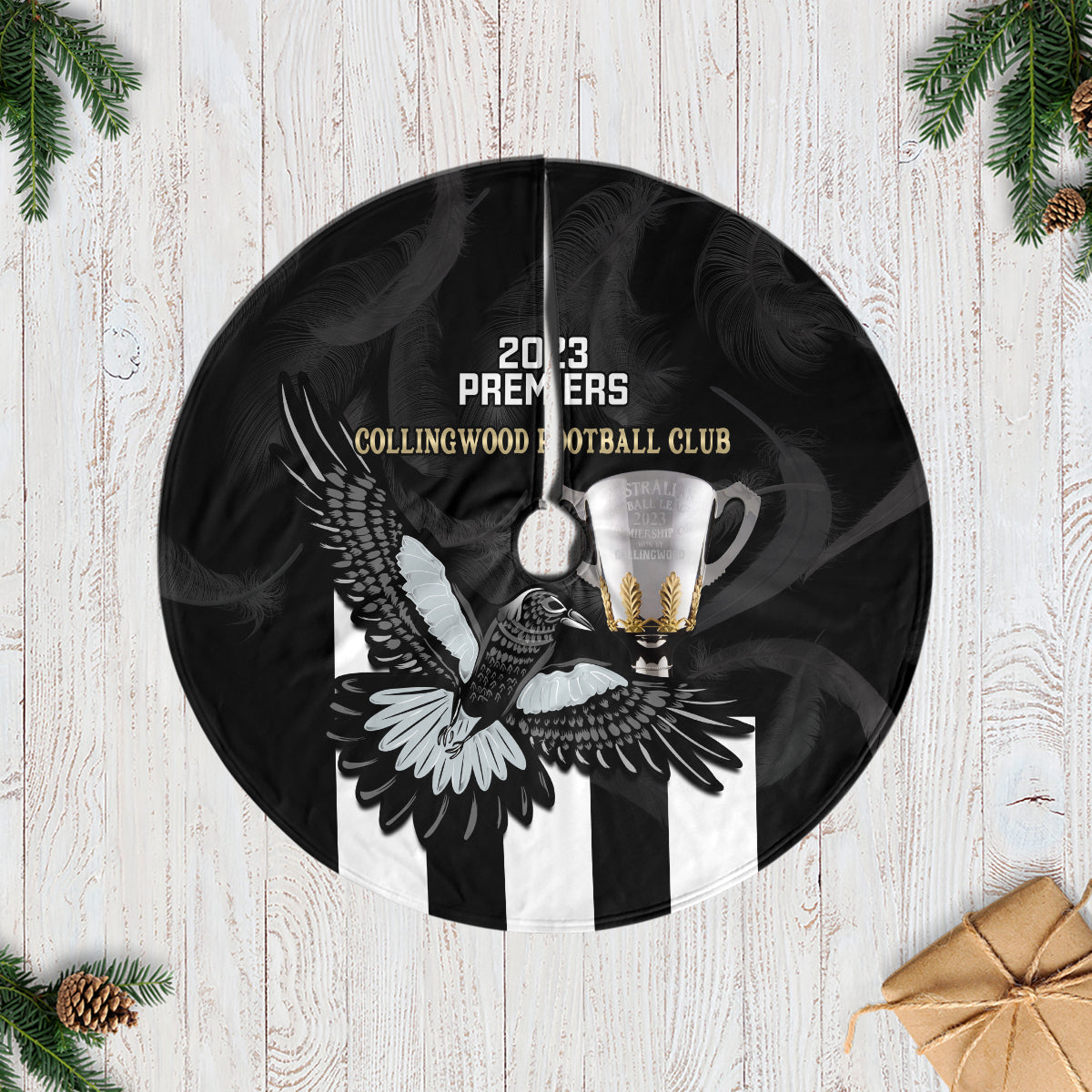 afl-collingwood-tree-skirt-magpies-premiers-2023-with-trophy-proud