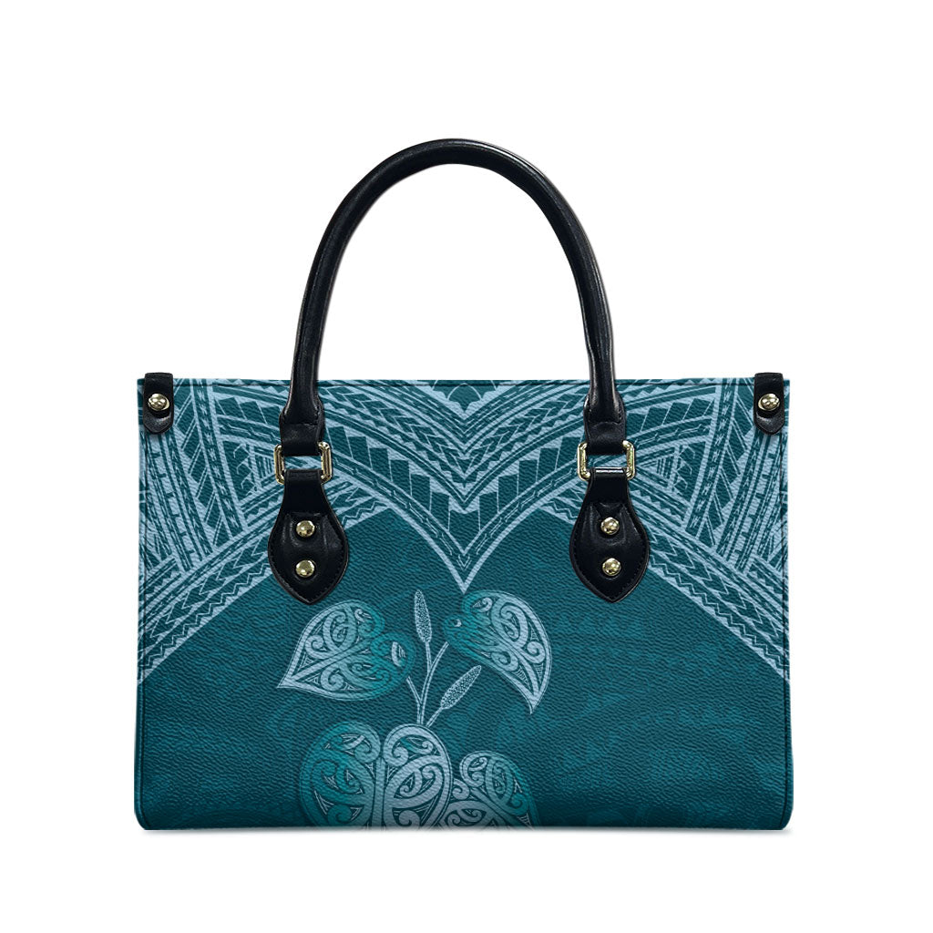 Cyan New Zealand Kawakawa Maori Ngaru Leather Bag