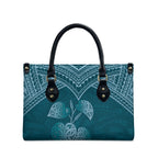 Cyan New Zealand Kawakawa Maori Ngaru Leather Bag