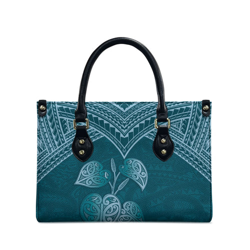 Cyan New Zealand Kawakawa Maori Ngaru Leather Bag