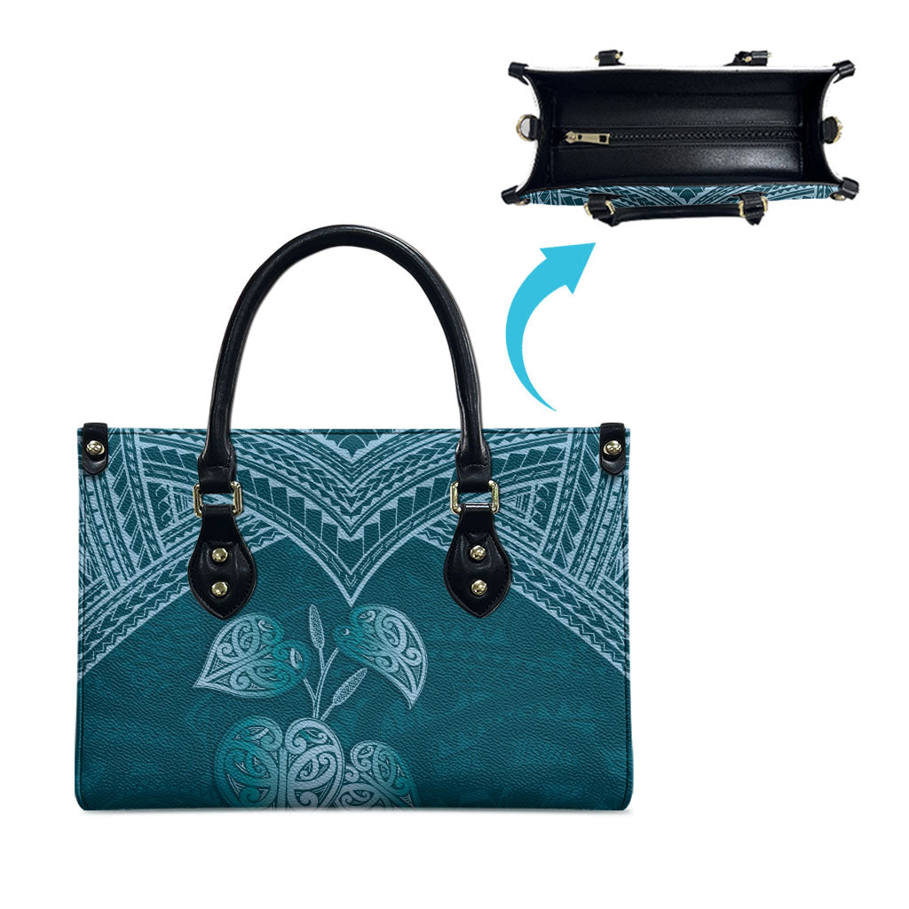 Cyan New Zealand Kawakawa Maori Ngaru Leather Bag