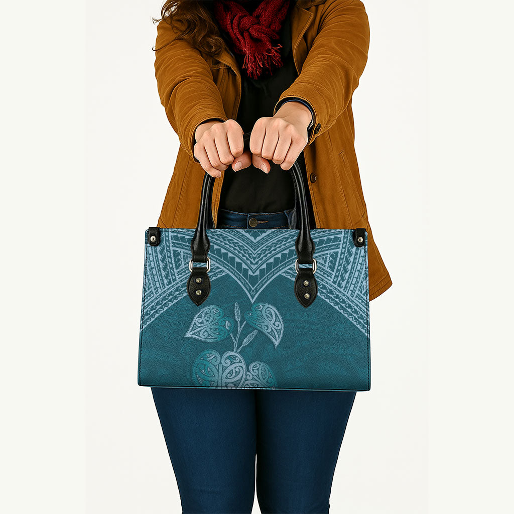 Cyan New Zealand Kawakawa Maori Ngaru Leather Bag