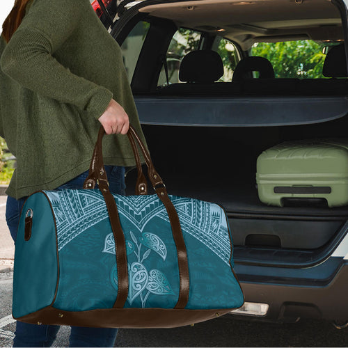 Cyan New Zealand Kawakawa Maori Ngaru Travel Bag