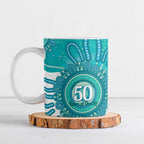 NAIDOC Week 2026 Ceramic Mug 50 Years Deadly Dhari Cyan Aboriginal Art