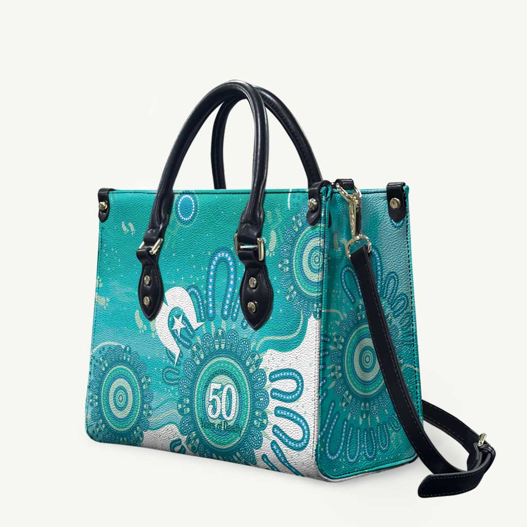 NAIDOC Week 2026 Leather Bag 50 Years Deadly Dhari Cyan Aboriginal Art