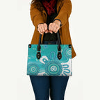 NAIDOC Week 2026 Leather Bag 50 Years Deadly Dhari Cyan Aboriginal Art