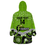 custom-thunder-cricket-christmas-wearable-blanket-hoodie-merry-xmas-2023-indigenous-art