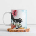 Willie wagtail Australia Ceramic Mug Banksia Bottlebrushes Watercolor Stylized - Aussie Hoodie