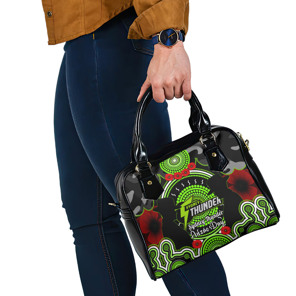 sydney-thunder-anzac-2024-shoulder-handbag-lest-we-forget-poppy-mix-camouflage
