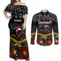 custom-panthers-rugby-christmas-couples-matching-off-shoulder-maxi-dress-and-long-sleeve-button-shirt-merry-xmas-2023-mix-aboriginal-art-black-version