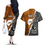 personalised-collingwood-and-giants-football-couples-matching-off-the-shoulder-long-sleeve-dress-and-hawaiian-shirt-2023-together-sporty-style