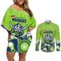 custom-raiders-rugby-christmas-couples-matching-off-shoulder-short-dress-and-long-sleeve-button-shirt-merry-xmas-2023-mix-aboriginal-art