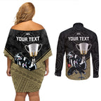 personalised-collingwood-football-couples-matching-off-shoulder-short-dress-and-long-sleeve-button-shirts-magpies-go-champions-2023-polynesian-indigenous-art