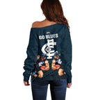 calrton-football-off-shoulder-sweater-blues-go-champions-2023-polynesian-indigenous-art